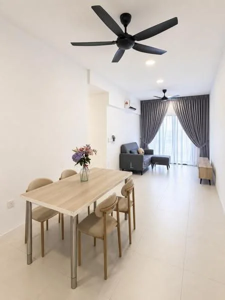 Dining features: light wood dining table, 4 wooden dining chairs, 5-blade ceiling fan in black, white painted walls, light tile flooring, floor-to-ceiling windows with sheer curtains, sofa in grey fabric, decorative vase with flowers, wall-mounted air conditioning unit, wooden sideboard; style: modern.