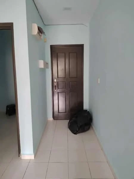 Room features: light blue painted walls, white tiled flooring, brown wooden door, wall-mounted air conditioning unit, wall-mounted intercom, black bag on the floor; style: modern.