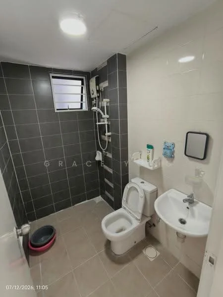 Bathroom features: grey tiled walls, white tiled walls, ceramic tile flooring, one-piece toilet, wall-mounted basin, chrome basin mixer faucet, shower with wall-mounted showerhead, window for ventilation, toilet roll holder, soap dispenser, mirror, shower hose, shower caddy; style: modern.
