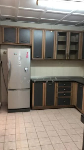 Kitchen features: grey and brown cabinetry, stainless-steel fridge, black countertop, ceramic tile flooring, wall-mounted cabinets, open shelving, double-basin sink, chrome faucet, tile backsplash, under-cabinet lighting; style: modern.
