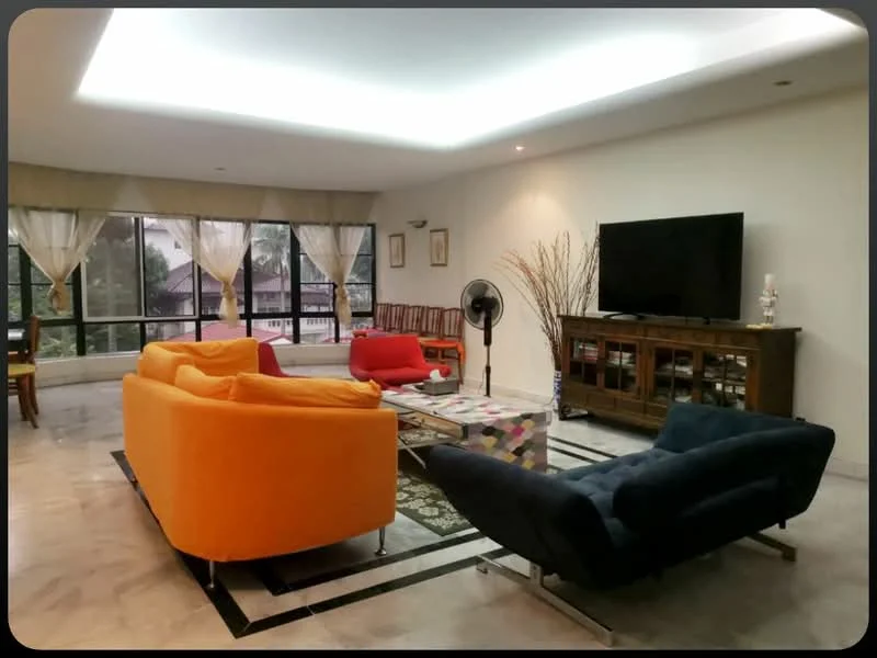 Living features: orange fabric sofa, red fabric sofa, navy blue fabric sofa, coffee table with colorful pattern, TV console with wooden finish, wall-mounted TV, marble flooring, recessed ceiling lights, large windows with sheer curtains, ceiling fan, decorative wall art, area rug with geometric pattern; style: modern; view: garden.