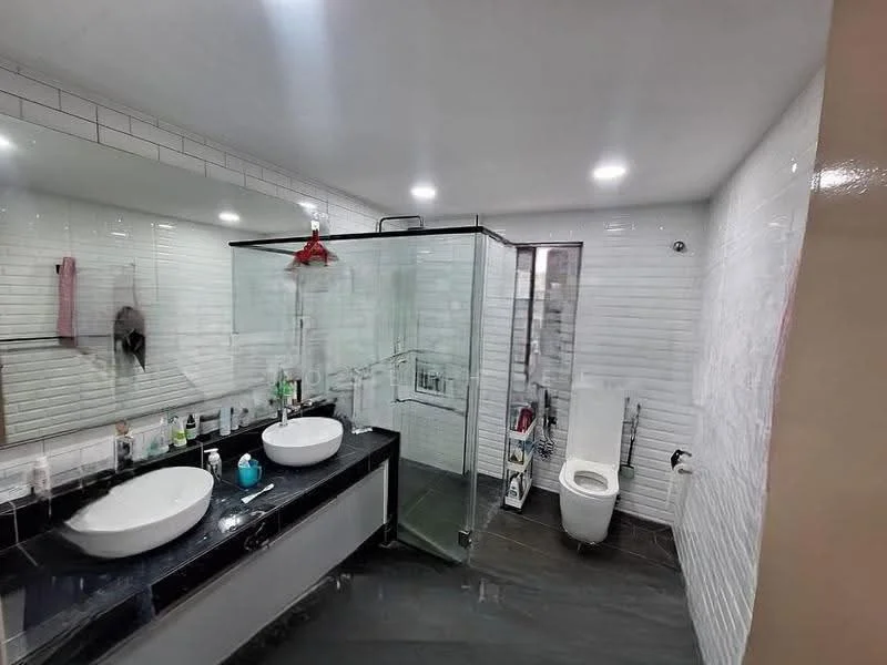 Bathroom features: double-sink vanity with black countertop, two round under-mount sinks, chrome basin mixers, large glass shower enclosure, rain shower head, handheld shower, white toilet, white tiled walls, black tiled flooring, recessed LED downlights, large wall-mounted mirror, shelf with toiletries; style: modern.