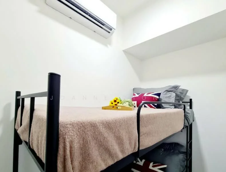 Bedroom features: bunk bed with black metal frame, beige bedspread, decorative pillows with Union Jack pattern, air conditioning unit mounted on wall, white painted walls, shelf above bed, small tray with flowers on bed; style: modern.