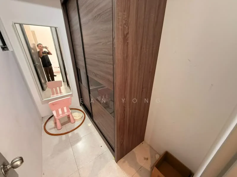 Room features: sliding wardrobe with wood finish, full-length mirror, pink children's chair, white walls, tile flooring, box in corner.
