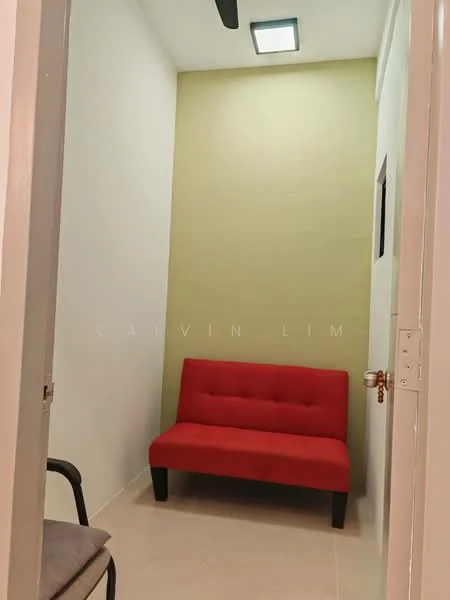 Room features: red fabric sofa, white painted walls, green accent wall, recessed ceiling light, tile flooring, ceiling fan, framed artwork on wall, small window; style: modern.
