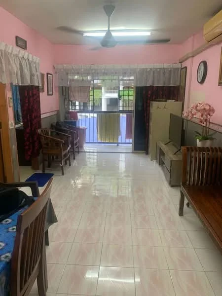 Living features: pink painted walls, white tiled flooring, ceiling fan, window with sheer curtains, sliding glass door to balcony, wooden sofa set, TV console, wall-mounted TV, decorative wall art, dining table with chairs, potted plant, curtains with floral pattern; style: traditional; view: garden.