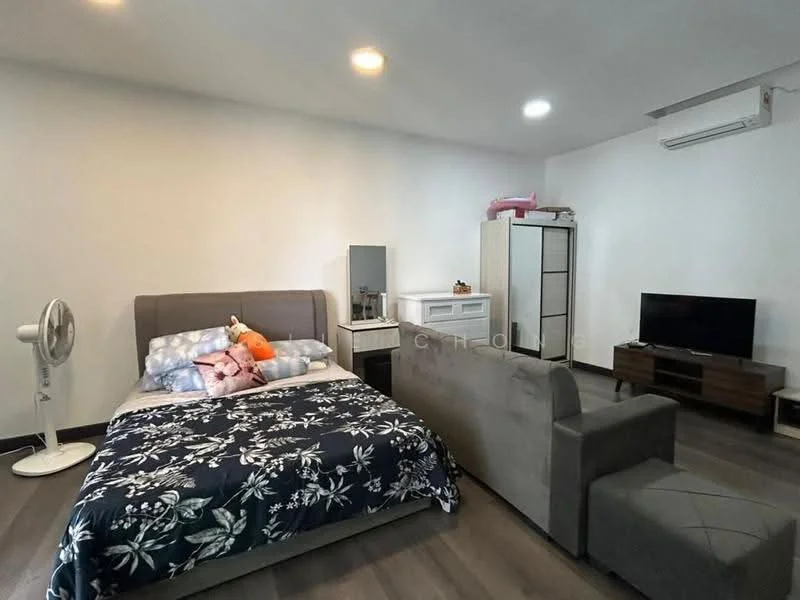 Bedroom features: queen-size bed with floral bedding, upholstered headboard, 2 bedside lamps, wooden flooring, wall-mounted TV, sofa chair in grey, dressing table with mirror, built-in wardrobe, 1 wall-mounted split AC, decorative wall art; style: modern.