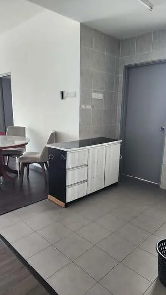 Room features: grey tiled flooring, white cabinetry with drawers, black countertop, light grey wall tiles, plain white walls, door with handle, dining table with chairs visible in background; style: modern.
