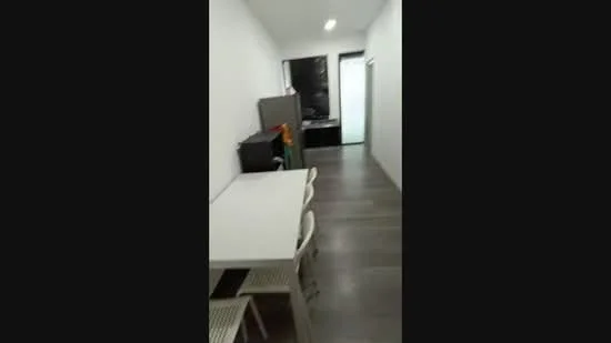 Room features: white painted walls, laminate flooring, dining table with four chairs, refrigerator, kitchen cabinets, countertop, sink, window, light fixtures; style: modern.
