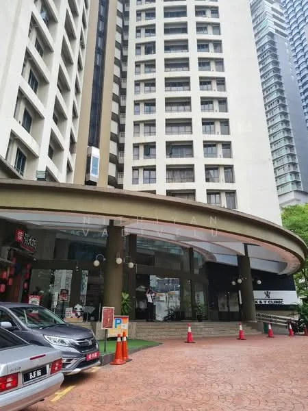 Exterior type: high-rise condominium; features: glass curtain wall, white painted facade, double-volume main lobby, porte cochère drop-off, marble flooring at entrance, surrounded by mature greenery, open-air parking lot; style: modern.