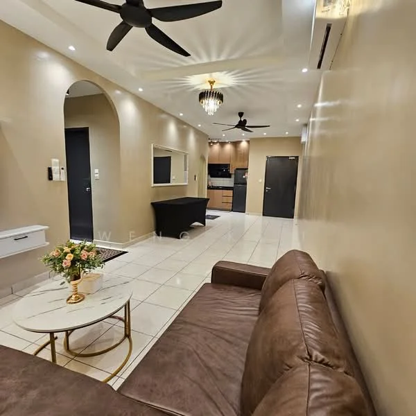 Living features: brown leather sofa, round coffee table with white top and gold legs, wall-mounted mirror, recessed downlights, chandelier, 5-blade ceiling fan, cream painted walls, tile flooring, air conditioning unit, open layout to kitchen, decorative flower arrangement; style: modern.