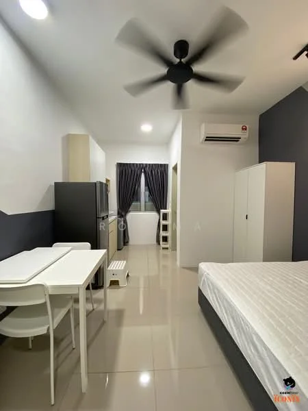 Room features: white painted walls, grey accent wall, glossy tile flooring, 5-blade ceiling fan, wall-mounted split AC, double-door fridge, white dining table, 4 white chairs, bed with mattress, built-in wardrobe, curtains, window, small bench; style: modern.