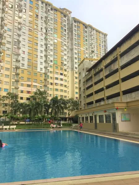 Exterior type: high-rise condominium; features: swimming pool, pool deck, surrounding palm trees, multi-storey car park, residential building facade with yellow and beige cladding, landscaped area with greenery; style: modern.