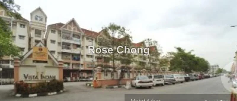 Exterior type: low-rise apartment block; features: cream painted facade, multiple storeys, balconies on upper floors, landscaped entrance with signage, manicured lawn, paved walkway, parking spaces visible, surrounded by trees; style: modern.