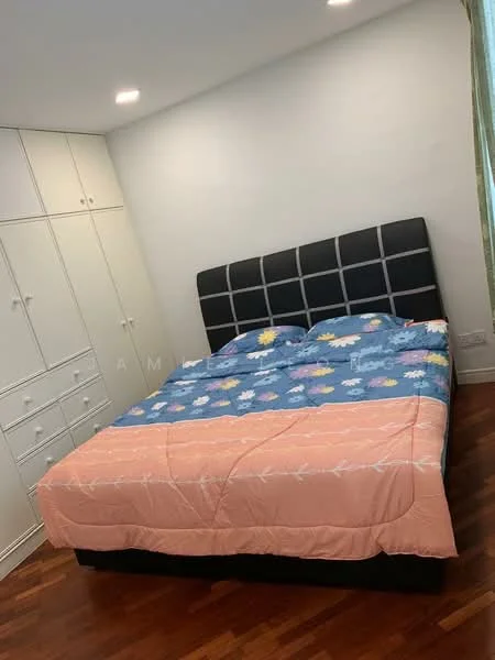 Bedroom features: king-size bed with black upholstered headboard, colorful patterned bedding, built-in wardrobe with white cabinetry, wooden flooring, recessed ceiling lights, green curtains, decorative wall with no visible artwork; style: modern.