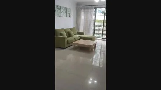 Living features: L-shape sectional sofa in green, coffee table, floor-to-ceiling windows, sheer curtains, white painted walls, polished tile flooring, recessed downlights; style: modern; view: garden.