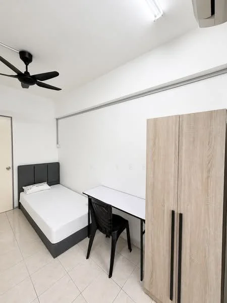 Bedroom features: single bed with upholstered headboard, white bedding, black plastic chair, white desk, wooden wardrobe with two doors, ceiling fan, white painted walls, tile flooring, window with blinds; style: minimalist.