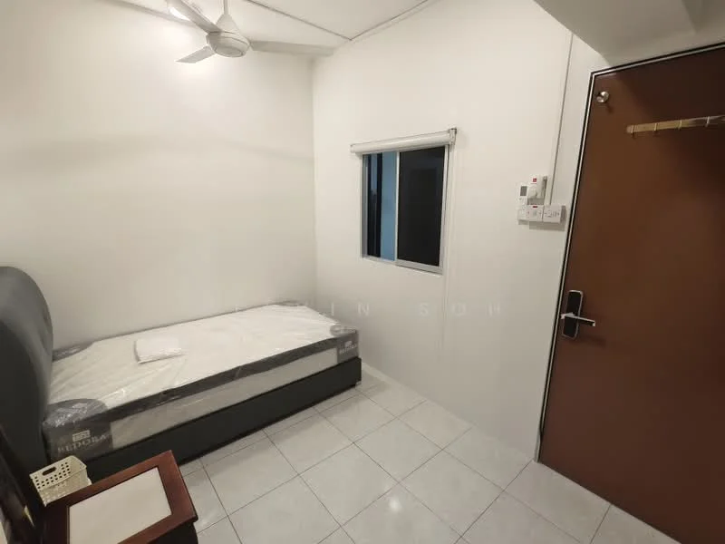 Bedroom features: single bed, white painted walls, white ceiling, ceiling fan, floor-to-ceiling window, tile flooring, wooden bedside table, door with handle.