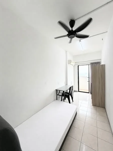 Room features: white painted walls, tile flooring, 5-blade ceiling fan, wall-mounted split AC, sliding glass door, balcony access, single bed frame, wooden wardrobe, table with chair, natural light from balcony; style: minimalist; view: city.