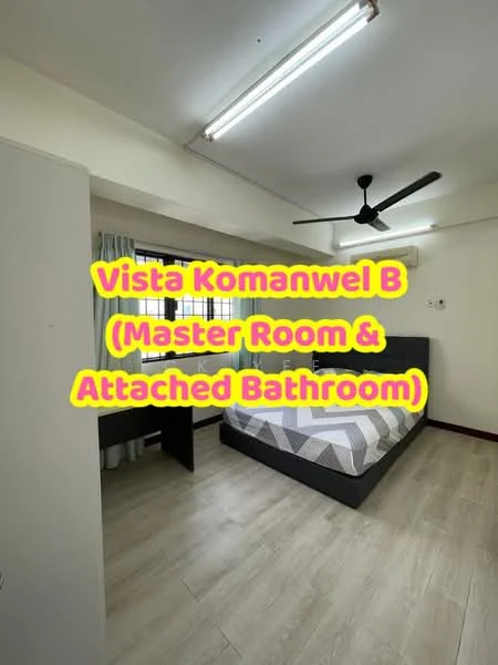 Bedroom features: queen-size bed with grey upholstered headboard, light grey and white striped bedding, wooden flooring, ceiling fan with light, window with sheer curtains, built-in wardrobe, desk with chair, wall-mounted electrical outlets; style: modern. Bathroom features: attached bathroom, white tiled walls, shower area, toilet, sink with mirror.
