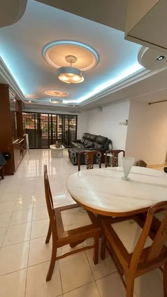Living features: white painted walls, glossy tile flooring, tray ceiling with recessed lighting, 5-blade ceiling fan with light, large glass sliding doors, black leather sectional sofa, wooden dining table with marble top, wooden dining chairs, decorative glass vase on table, LED strip lighting along ceiling; style: modern.
