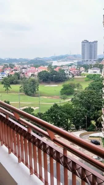 Room features: balcony with wooden railing, view of green golf course, view of city skyline, surrounding residential area, trees in view, cloudy sky; view: garden.