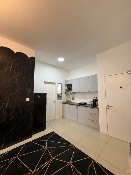 Kitchen features: black marble accent wall, light grey cabinetry, white countertop, stainless-steel fridge, built-in sink, single-bowl stainless-steel sink, chrome faucet, ceramic tile flooring, recessed ceiling lights, window above sink, kitchen utensils on countertop, open shelving, black and gold geometric area rug; style: modern.