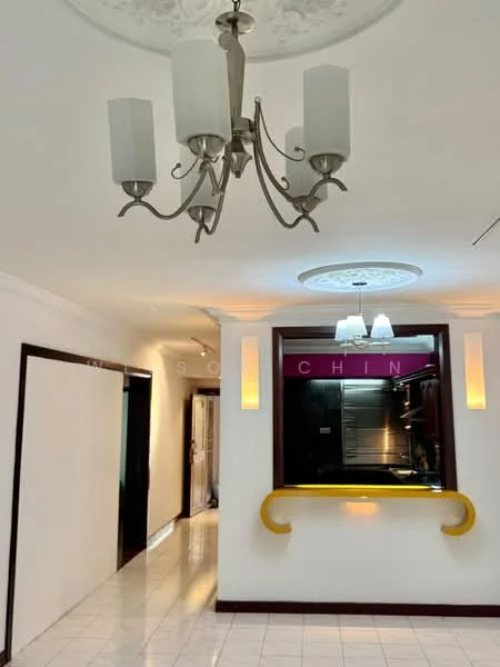 Room features: white painted walls, glossy tile flooring, chandelier with glass shades, recessed ceiling lights, open kitchen pass-through, yellow countertop, decorative ceiling rose, wall-mounted cabinetry in kitchen area; style: modern.
