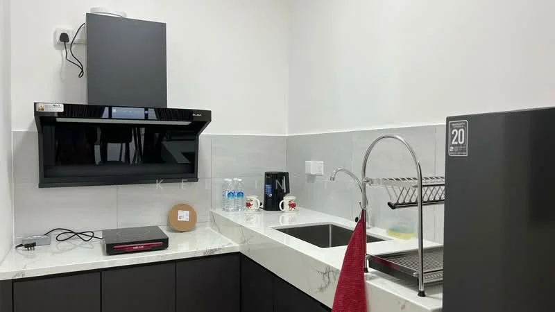 Kitchen features: black wall-mounted range hood, white marble countertop, black cabinetry, stainless-steel sink, chrome pull-down faucet, built-in induction cooktop, dish drying rack, kitchen utensils holder, two bottles of water, two coffee mugs, wall-mounted electrical outlet; style: modern.