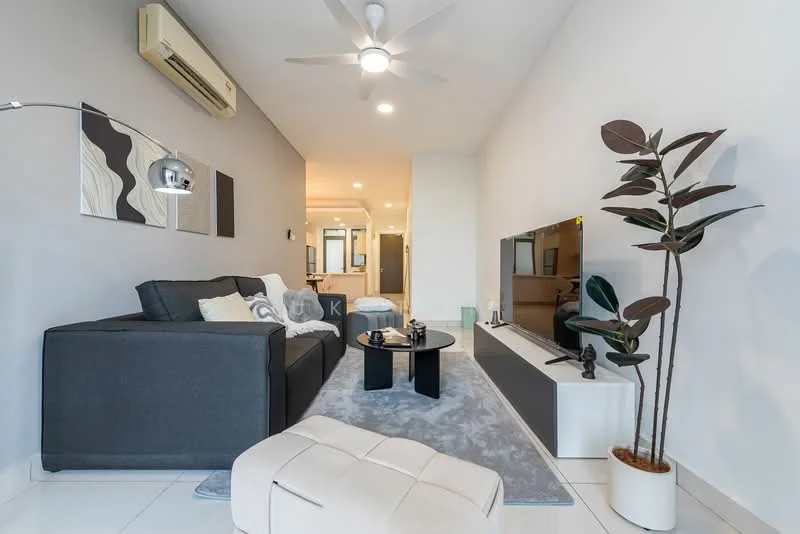 Living features: 3-seater fabric sofa in grey, coffee table, wall-mounted TV, TV console, area rug with geometric pattern, ceiling fan with light, decorative plant in ceramic pot, framed artwork on walls, white painted walls, tile flooring; style: modern.