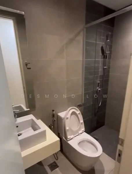 Bathroom features: white toilet, single-sink vanity with white cabinet, chrome basin mixer faucet, walk-in shower with glass enclosure, rain shower head, grey tile flooring, grey wall tiles, mirror above vanity, built-in shelving, towel rail; style: modern.