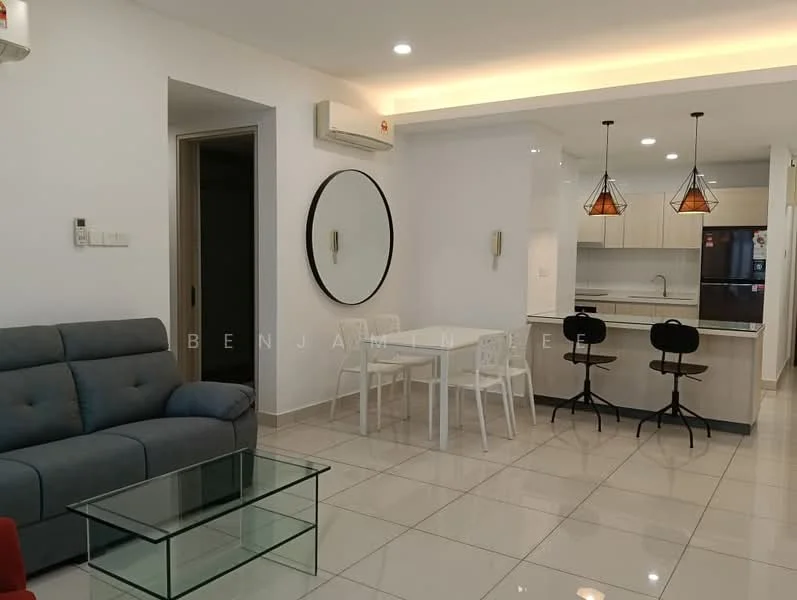 Living features: grey fabric sofa, glass coffee table, white dining table, four white dining chairs, pendant lighting, wall-mounted air conditioning unit, recessed ceiling lights, white painted walls, tile flooring, open layout to kitchen, round wall mirror; style: modern. Kitchen features: white cabinetry, stainless-steel fridge, built-in oven, ceramic cooktop, kitchen island with seating, white countertops, recessed downlights; style: modern.