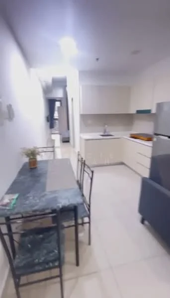 Kitchen features: white cabinetry, grey countertop, stainless-steel sink, chrome pull-down faucet, built-in oven, freestanding fridge, ceramic tile flooring, recessed downlights, open layout, dining table with black marble top, metal dining chairs, neutral wall color; style: modern.