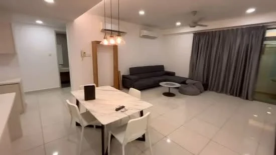 Living features: grey fabric sectional sofa, white coffee table, bean bag chair, 4-seater dining table with marble top, white dining chairs, recessed LED downlights, ceiling fan, sliding glass door, floor-to-ceiling curtains, white tiled flooring, white painted walls; style: modern. Room features: open layout, kitchen area visible, doorway leading to bathroom.