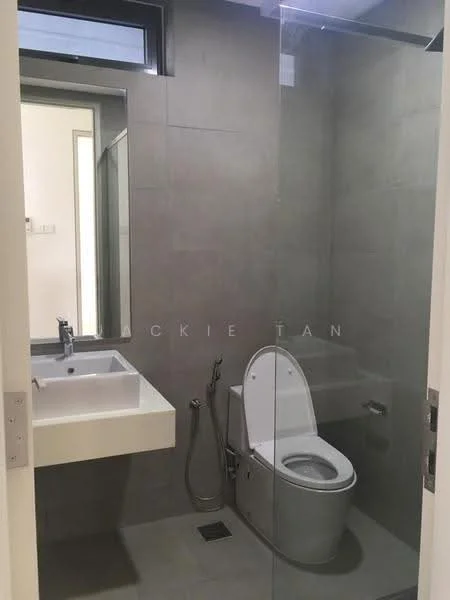 Bathroom features: grey tiled walls, grey tiled flooring, single-sink vanity with white cabinet, chrome basin mixer faucet, framed mirror, one-piece toilet, bidet spray, glass shower enclosure, shower head, wall-mounted towel rack; style: modern.