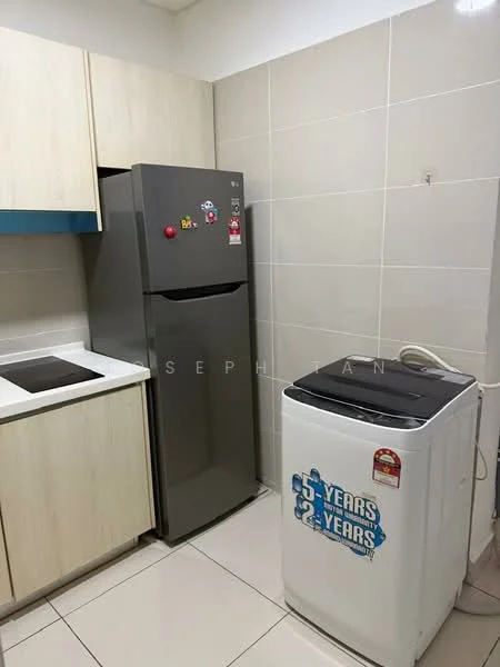 Kitchen features: grey refrigerator, white washing machine, white countertop, light wood cabinetry, built-in stove, cream tiled walls, glossy floor tiles, magnetic fridge decorations; style: modern.