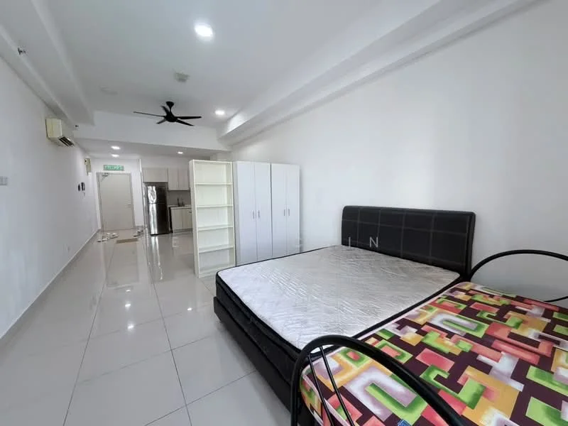 Bedroom features: queen-size bed, black metal bed frame, mattress without bedding, white painted walls, glossy tile flooring, 5-blade ceiling fan, built-in wardrobe with sliding doors, air conditioning unit, floor-to-ceiling windows, natural light from windows; style: modern. Room features: open layout, kitchen area visible, refrigerator visible, white cabinetry, neutral color scheme.