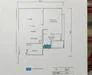 Floor plan: 2-bedroom 1-bathroom unit; features: open-plan kitchen-dining-living, master bedroom with ensuite bathroom, bedroom 2 with shared bathroom, utility room, balcony off living room, central foyer.