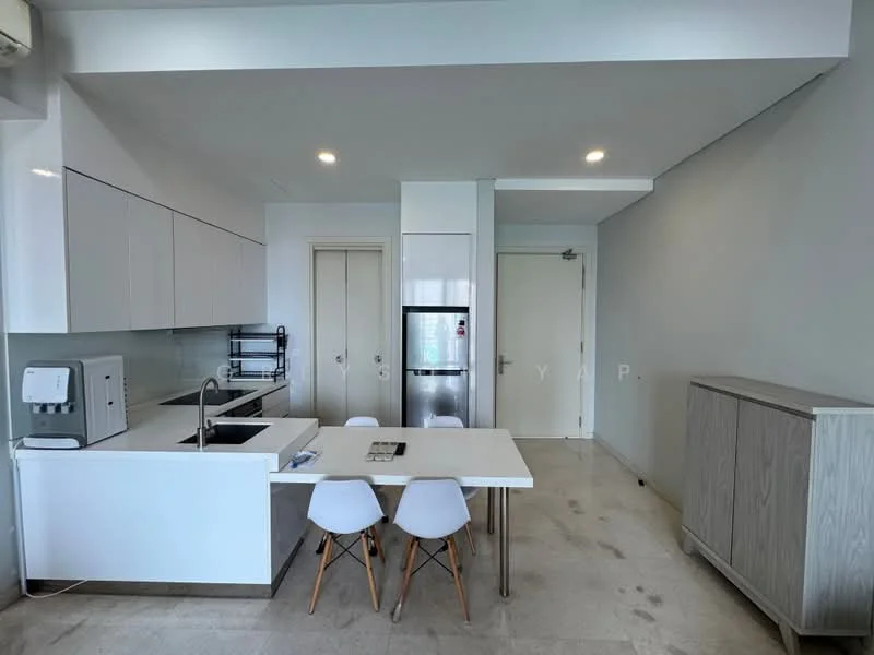Kitchen features: white cabinetry, marble countertop, stainless-steel sink, chrome pull-down faucet, built-in oven, stainless-steel fridge, 4-burner gas hob, dining table with 4 white chairs, light-colored stone flooring, recessed downlights, neutral painted walls; style: modern.