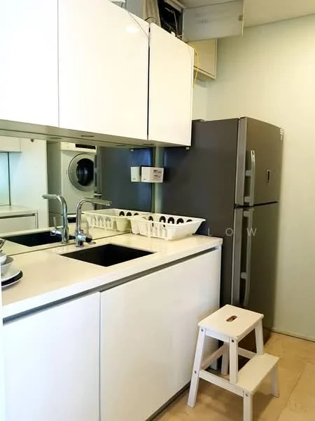Kitchen features: white cabinetry, double-bowl stainless-steel sink, chrome pull-down faucet, white countertop, stainless-steel fridge, built-in washing machine, step stool, dish rack; style: modern.