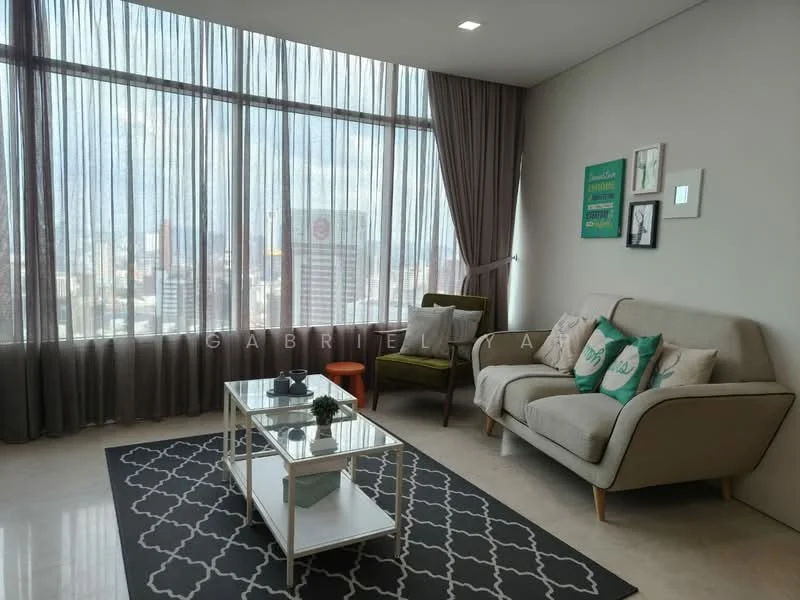 Living features: floor-to-ceiling windows, sheer curtains, grey fabric sofa, decorative cushions, glass coffee table, area rug with geometric pattern, green accent chair, wall-mounted artwork, marble flooring, recessed downlights; style: modern; view: city.