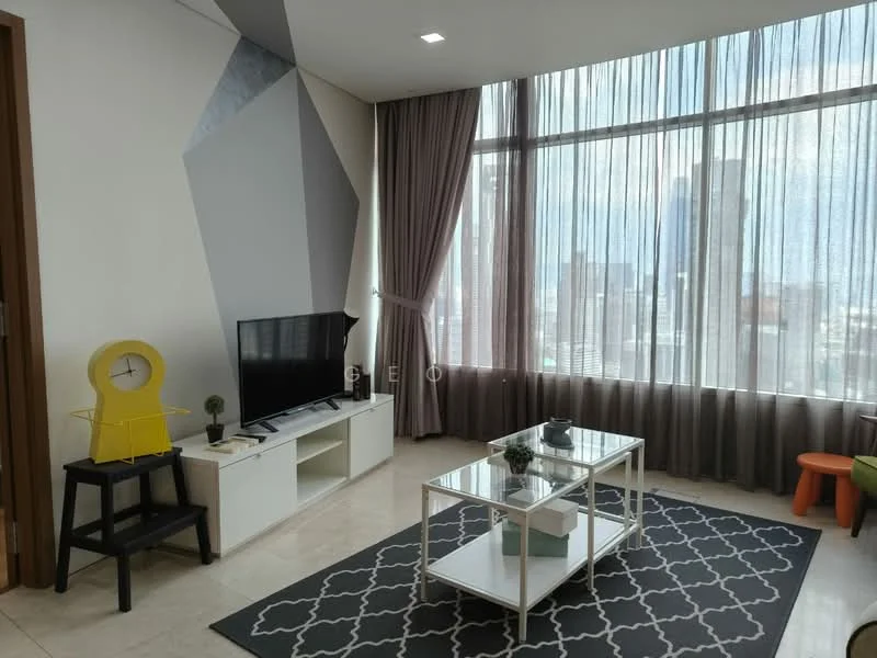 Living features: floor-to-ceiling windows, grey accent wall, white painted walls, marble tile flooring, 3-seater fabric sofa in grey, glass coffee table, black and white area rug with geometric pattern, TV console, wall-mounted TV, decorative clock, green potted plant, orange stool, curtains; style: modern; view: city.