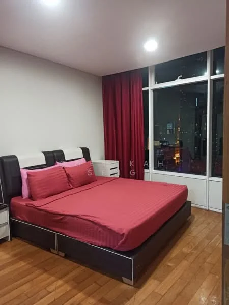 Bedroom features: king-size bed with pink bedding, upholstered headboard, wooden flooring, floor-to-ceiling windows, red curtains, nightstands with drawers, table lamps on nightstands, city view from window, recessed ceiling lights; style: modern; view: city.