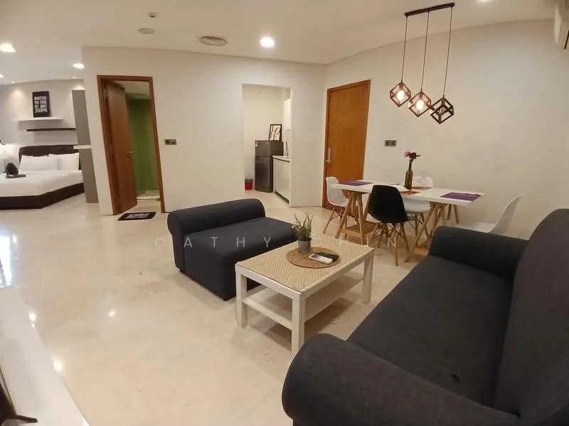 Living features: grey fabric sofa, white coffee table with woven mat, pendant lighting with three bulbs, marble tile flooring, wall-mounted TV, decorative plant on table, open layout to dining area, neutral wall color; style: modern. Dining features: white dining table, four white dining chairs, purple placemats, decorative flower vase, neutral wall color; style: modern. Kitchen features: stainless-steel refrigerator, white cabinetry, black countertop, open layout to living area; style: modern.