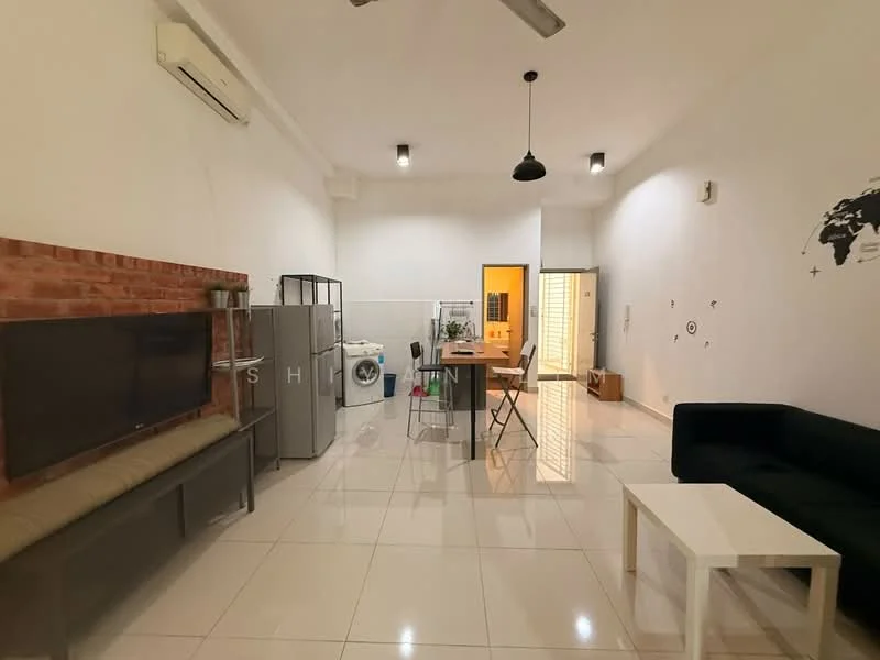 Living features: white painted walls, exposed brick accent wall, polished ceramic tile flooring, 5-blade ceiling fan, recessed downlights, wall-mounted TV, sofa in black fabric, coffee table in white, dining table with chairs, stainless-steel fridge, washing machine, open layout, decorative wall art; style: modern.