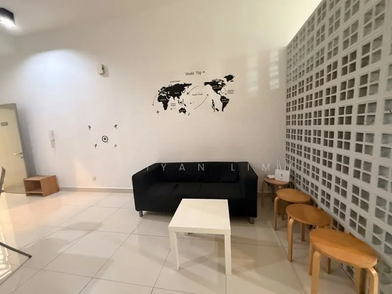 Living features: black fabric sofa, white coffee table, three wooden stools, white tiled flooring, decorative wall with world map, glass block wall, wall-mounted light fixture, neutral wall color; style: modern.