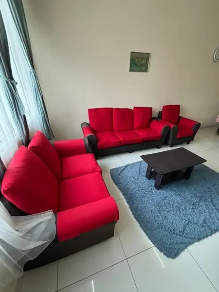 Living features: red fabric 3-seater sofa, red fabric armchair, black wooden frame for sofas, blue area rug, white tiled flooring, floor-to-ceiling windows with sheer curtains, wall-mounted artwork, light-colored walls; style: modern.
