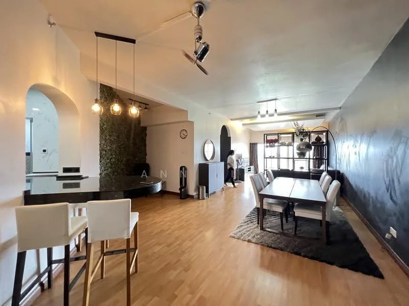 Living features: wooden flooring, black accent wall, white painted walls, recessed downlights, pendant lighting with three bulbs, large windows for natural light, dining table with six chairs, area rug, decorative wall plants, wall clock, open layout to kitchen, bar stools at counter; style: modern.