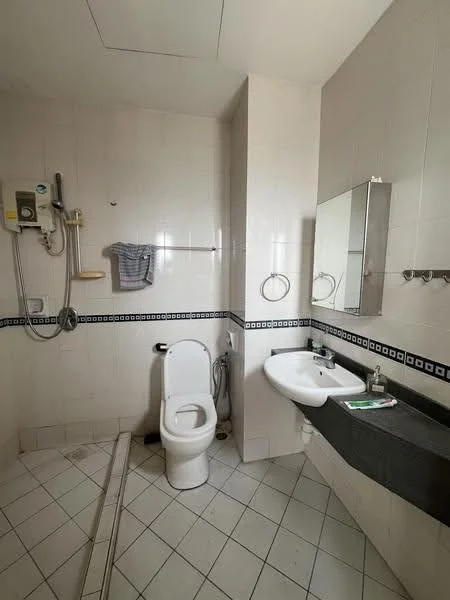 Bathroom features: white tiled walls, white ceramic floor tiles, single-sink vanity with grey countertop, mirror above sink, one-piece toilet, shower area with wall-mounted showerhead, grab bar in shower area, towel rack, soap holder, hand towel, wall-mounted toiletries shelf.