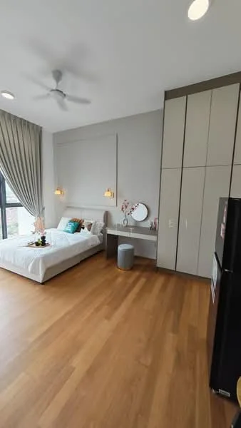 Bedroom features: queen-size bed with white bedding, upholstered headboard, two bedside lamps, built-in wardrobe with sliding doors, wooden flooring, ceiling fan, large window with curtains, dressing table with mirror, decorative vase on table, small stool, refrigerator; style: modern; view: garden.